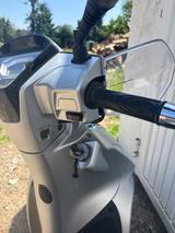 Kymco New People S200i ABS - KYMCO ROLLER 200