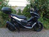 Aprilia SR GT 125 1. Hand & Topcase - APRILIA SR 125