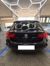BMW M140i xDrive Special Edition und BMW Service - schwarze BMW M140i