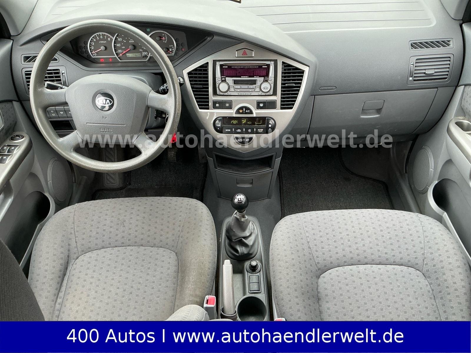 Kia Carens 2005 — photo 11