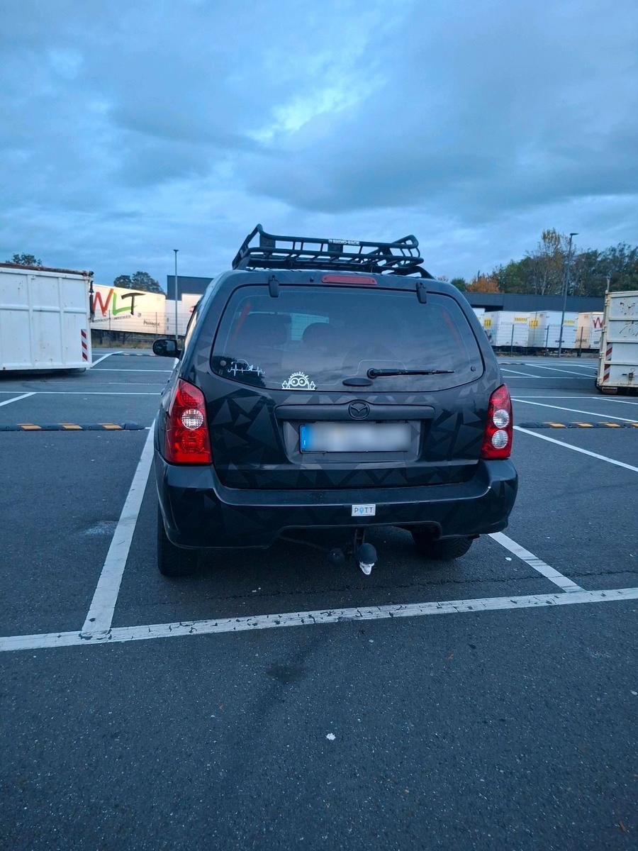 Mazda Tribute 2006 — rear view