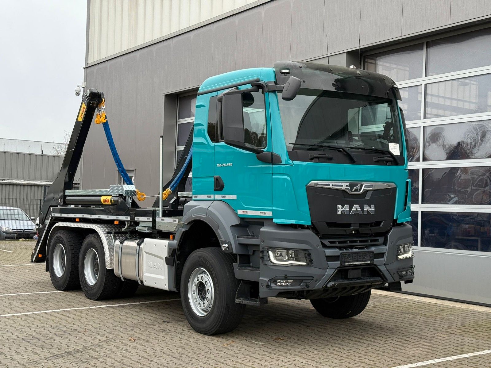 Fahrzeugabbildung MAN TGS 26.520 Absetzkipper HYVA 18 TAZ / Funk / 6x4