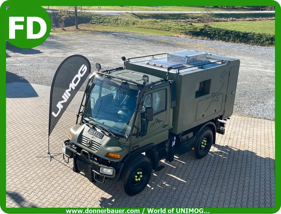 Unimog mit Wohnkoffer und Pritsche