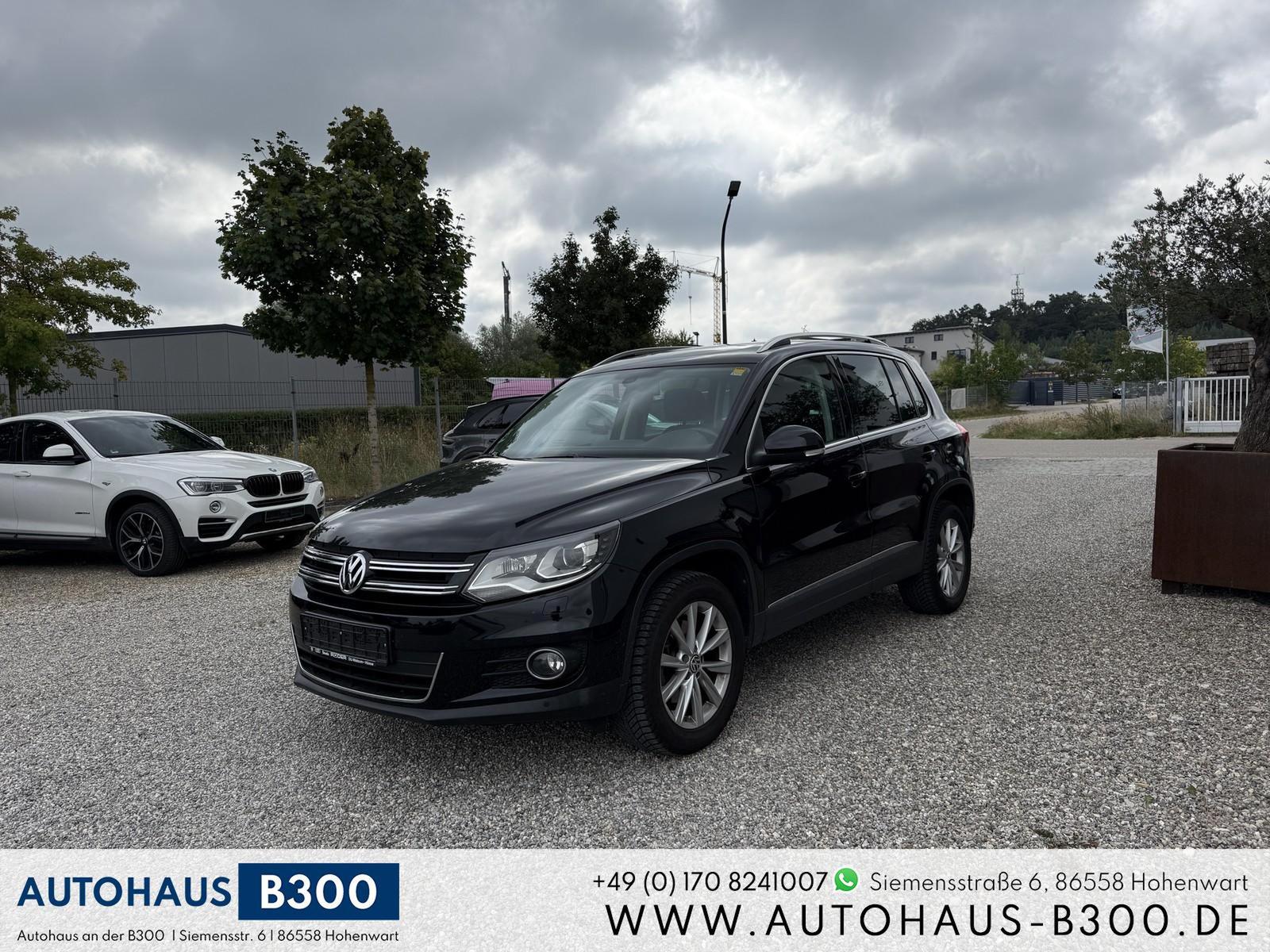 Volkswagen Tiguan Sport & Style 1.4 TSI*1.HAND*NAVI*PANO*