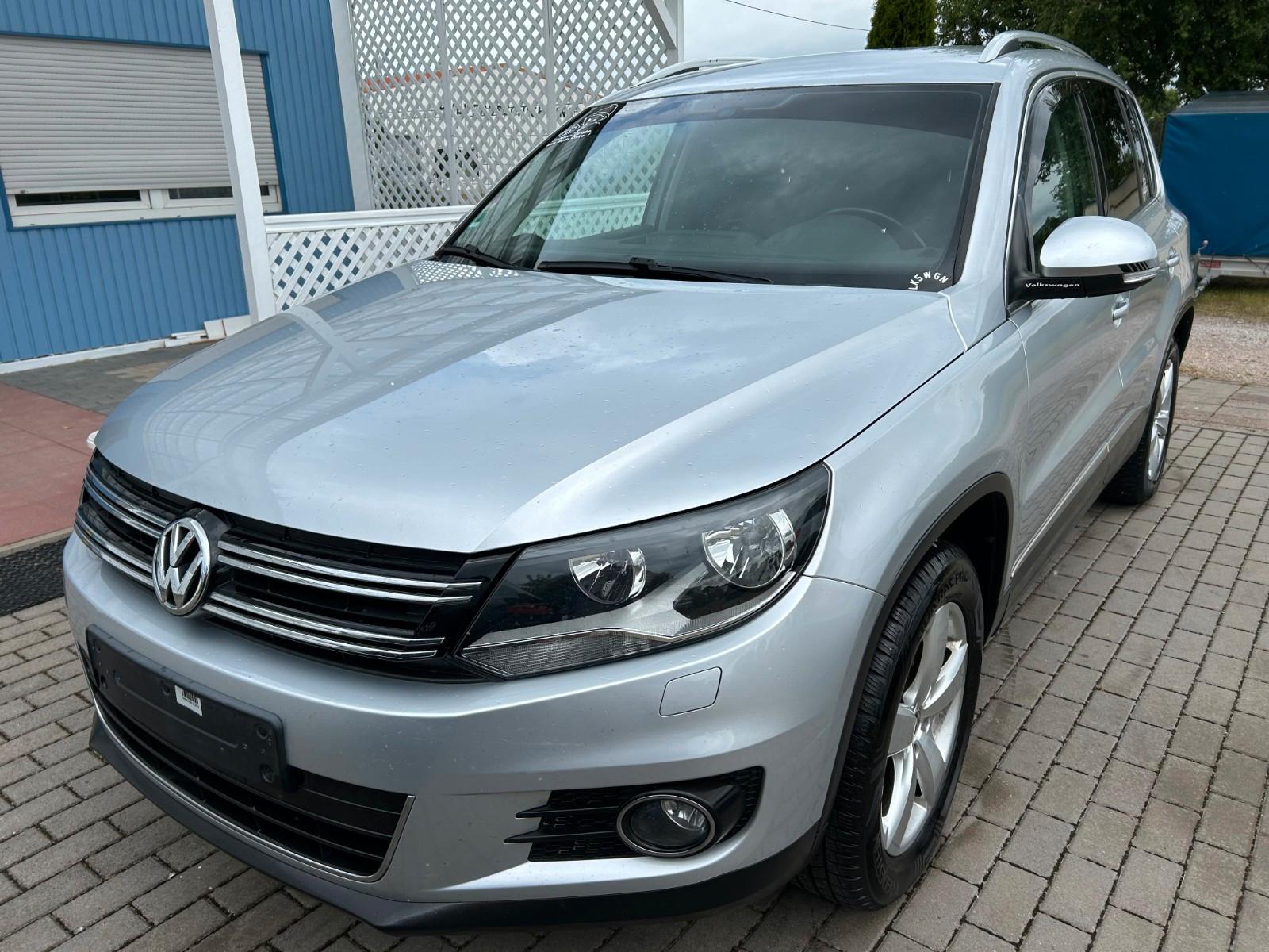 Volkswagen Tiguan 1.4 TSI Sport & Style Klima AHK Navi Lede