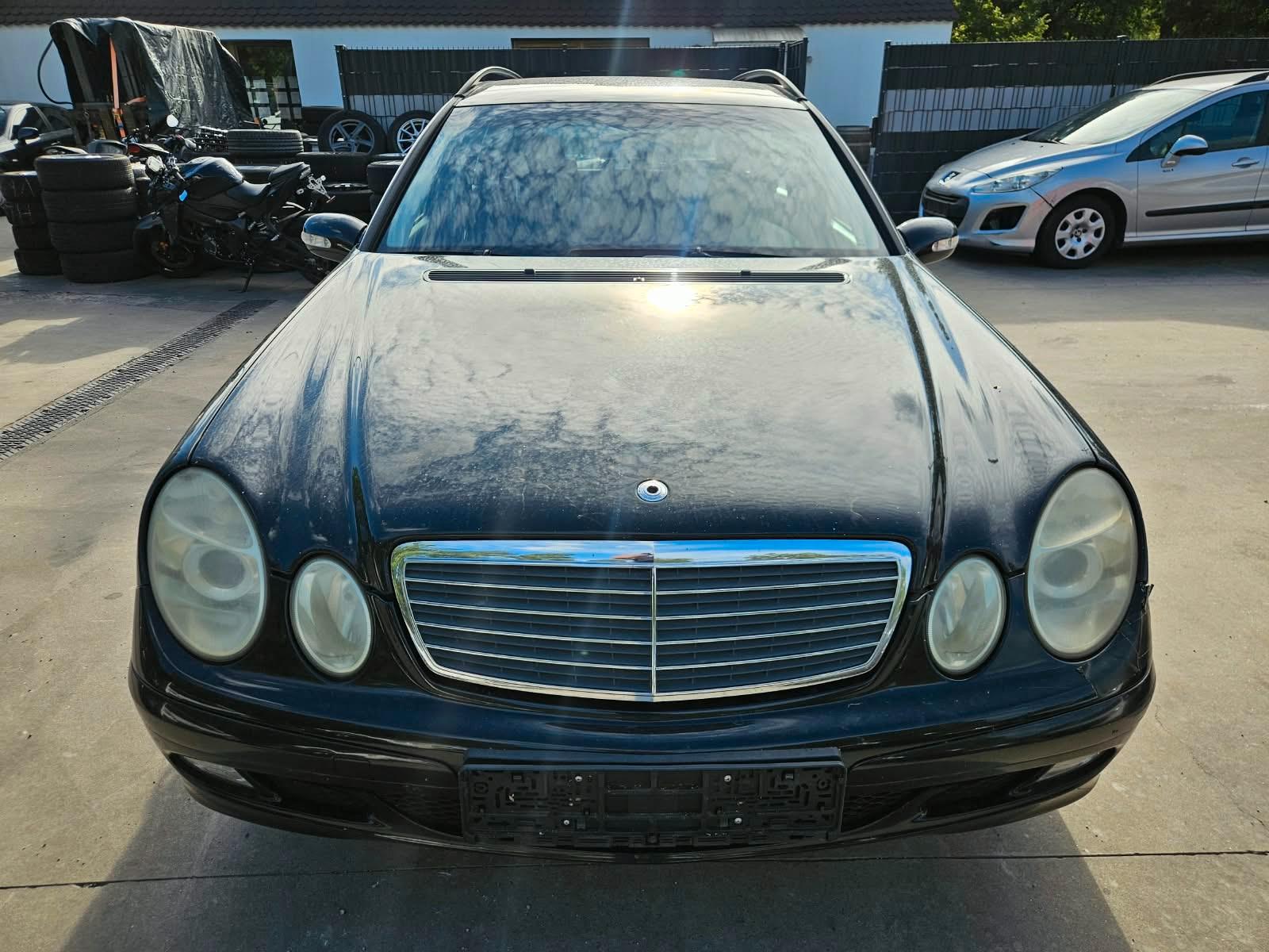 Mercedes-Benz E220 2004 — engine 2.148 cm³, 150 HP (110kW)