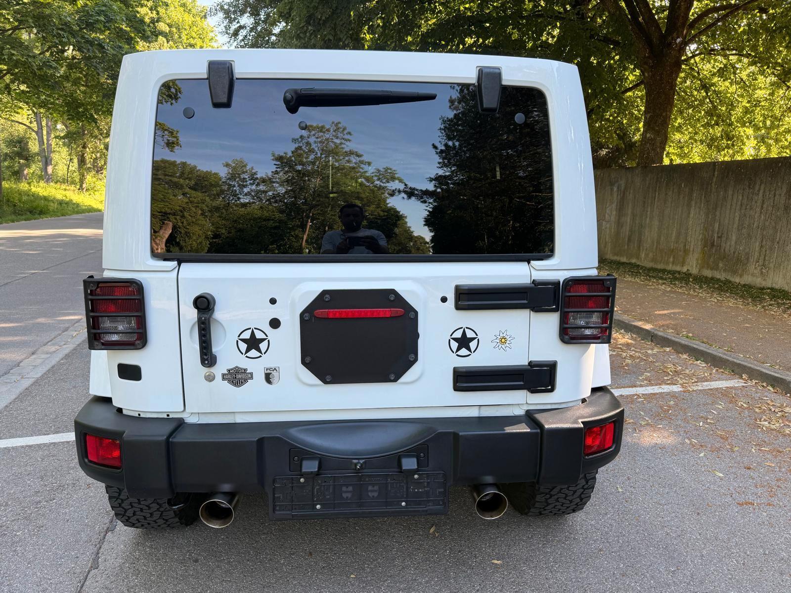 Jeep Wrangler Unlimited Sport 3.6 V6 284ch - 1 ère main - Carnet entretien - Toit ouvrant - Sièges chauffants