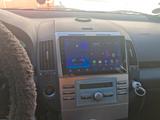 Toyota Corolla 1.8 7 Sitz - Toyota Corolla Si mit Benzin-Antrieb