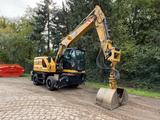 CAT M314 MH Umschlagbagger inkl. 3 Geräten