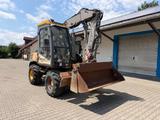 MECALAC 12 MXT BJ.2008 / 5500h + Equipment  - MECALAC Mobilbagger