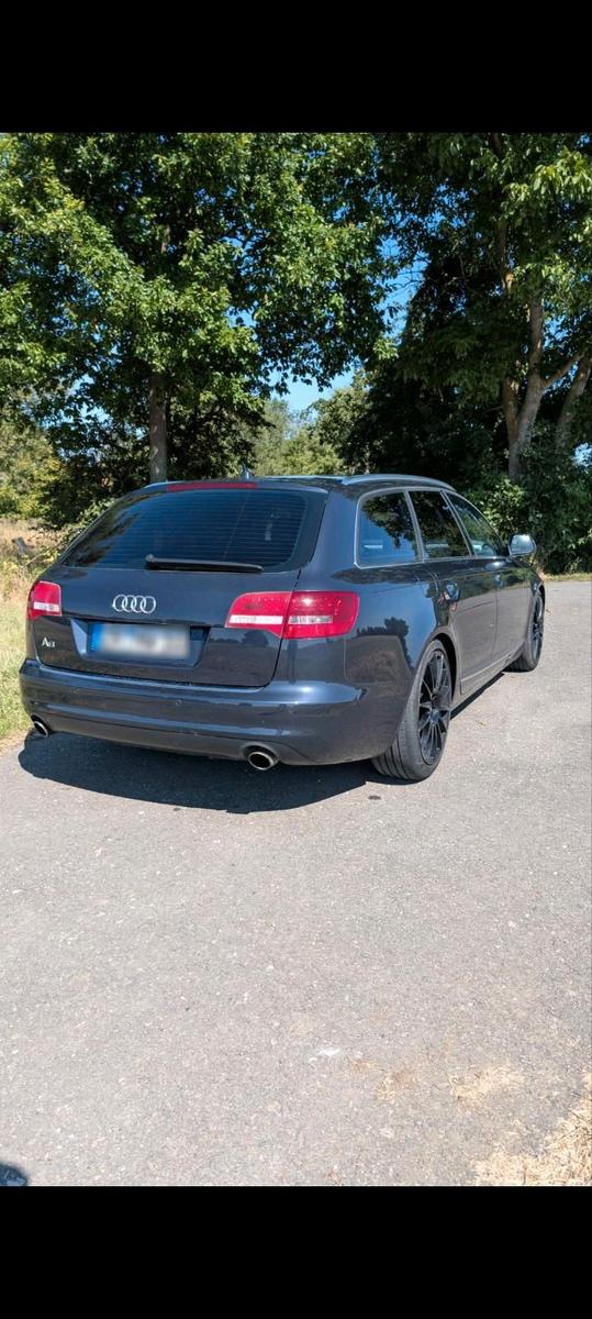 Audi A6 2010 — вигляд ззаду