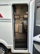 Fahrzeugabbildung Roller Team Kronos 295 TL Hub-Bett SAT TV 5 Schlafplätze