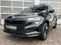 SKODA Karoq 1.5 TSI DSG Sportline PANO KAM AHK 4JGAR bei Autohaus Landmann & Maier OHG