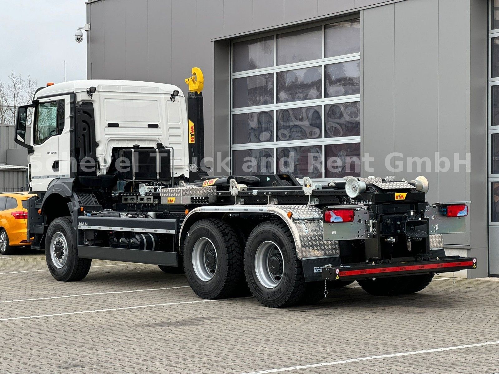 Fahrzeugabbildung MAN TGS 33.480 Abrollkipper HYVA  / 26-55s 6x6/60Ton