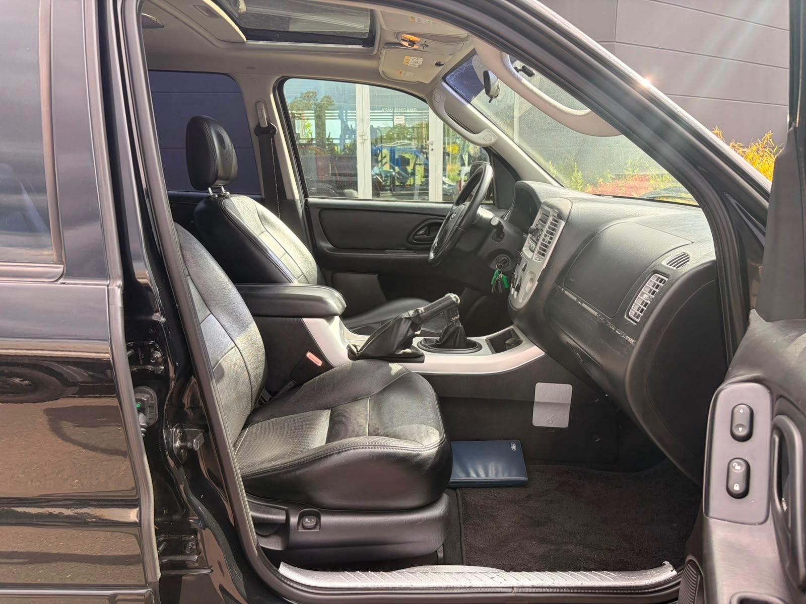 Ford Maverick 2004 — photo 12