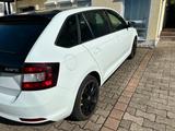 Skoda  1.2 TSI Spaceback Monte Carlo*Xenon*SHZ*AHK*DAB - weiße Skoda Rapid