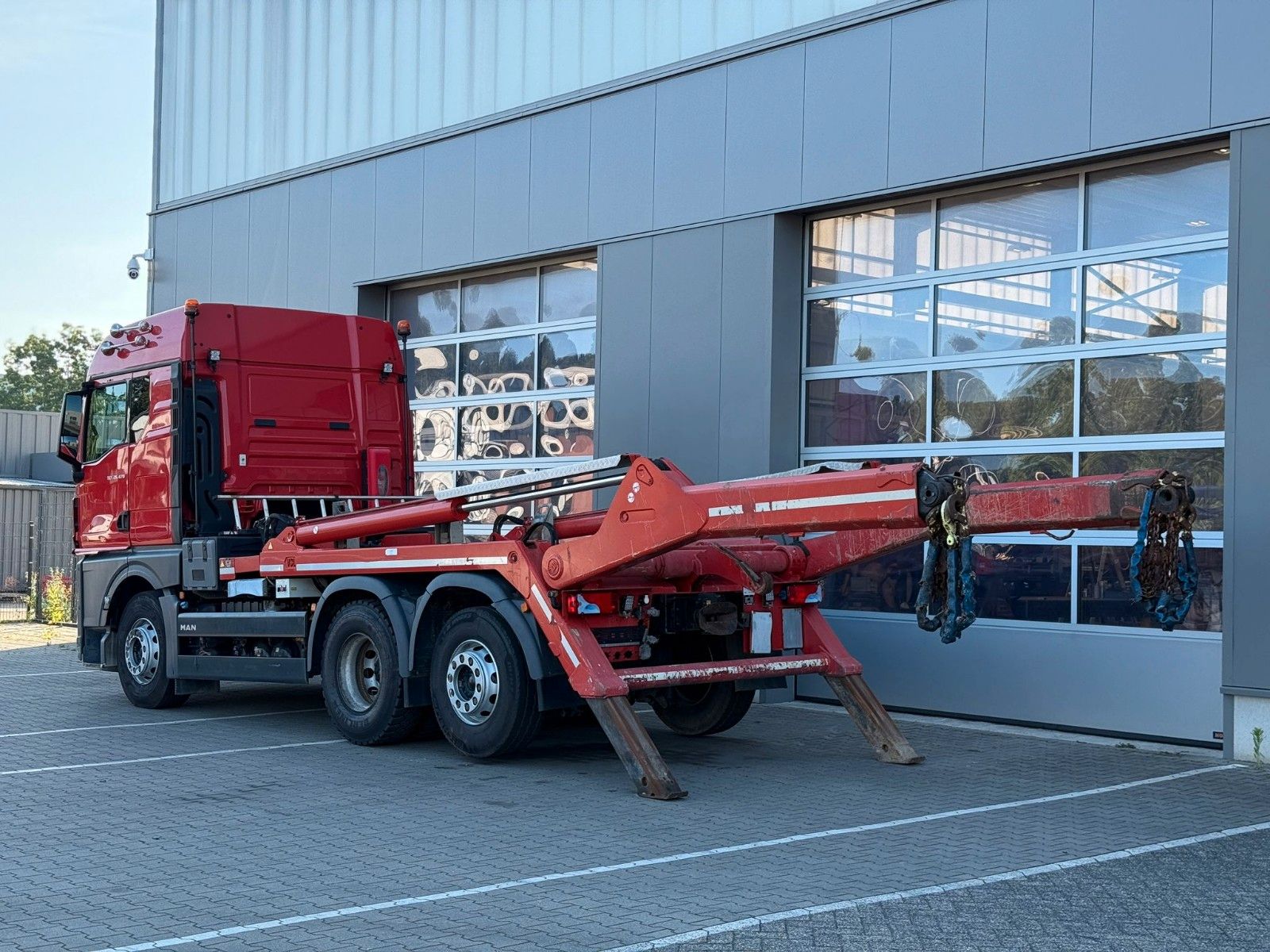 Fahrzeugabbildung MAN TGX 26.470 6x2-4 BL VDL P-18 Absetzkipper Funk.