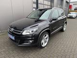 Volkswagen Tiguan 1.4TSI Lounge Sport & Style*BI-XENON*NAVI - Volkswagen Tiguan in Lübeck