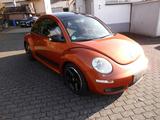 Volkswagen New Beetle Lim. 1.9 TDI BlackOrange/8fach bereif - rote Volkswagen New Beetle