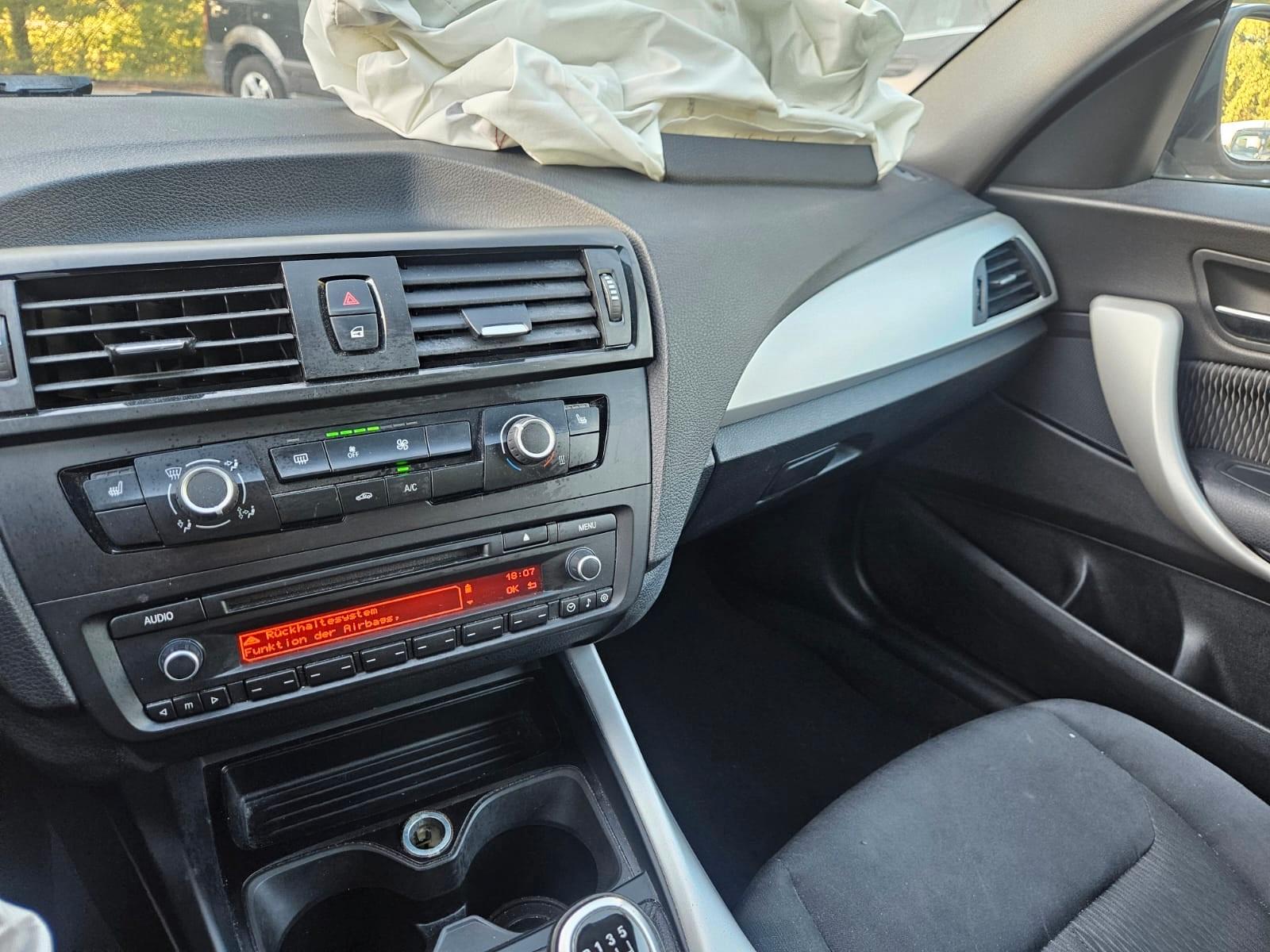 BMW 116 2012 — photo 17
