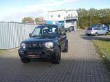 Suzuki Jimny 1.3 Automatik*AHK*Klima*4x4 - Suzuki Jimny Gebrauchtwagen