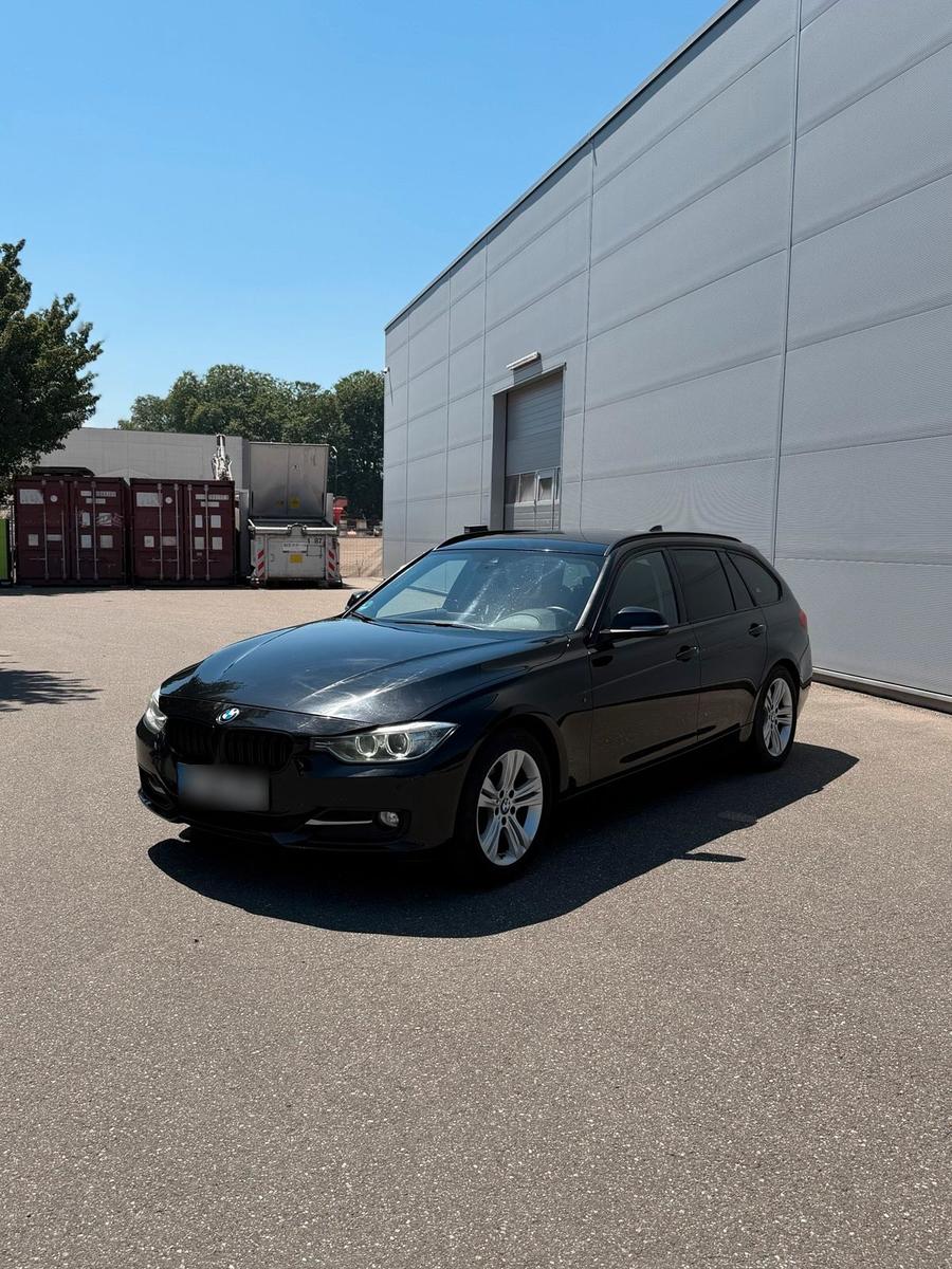 BMW 320 2012 — rear view