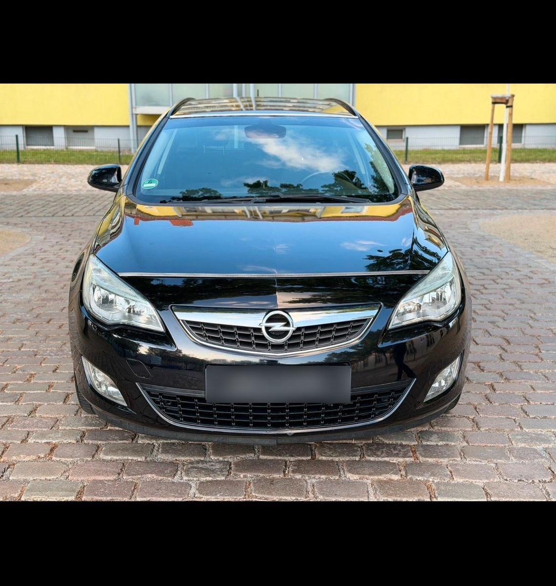 Opel Astra 2011 — engine 110 HP (81kW)