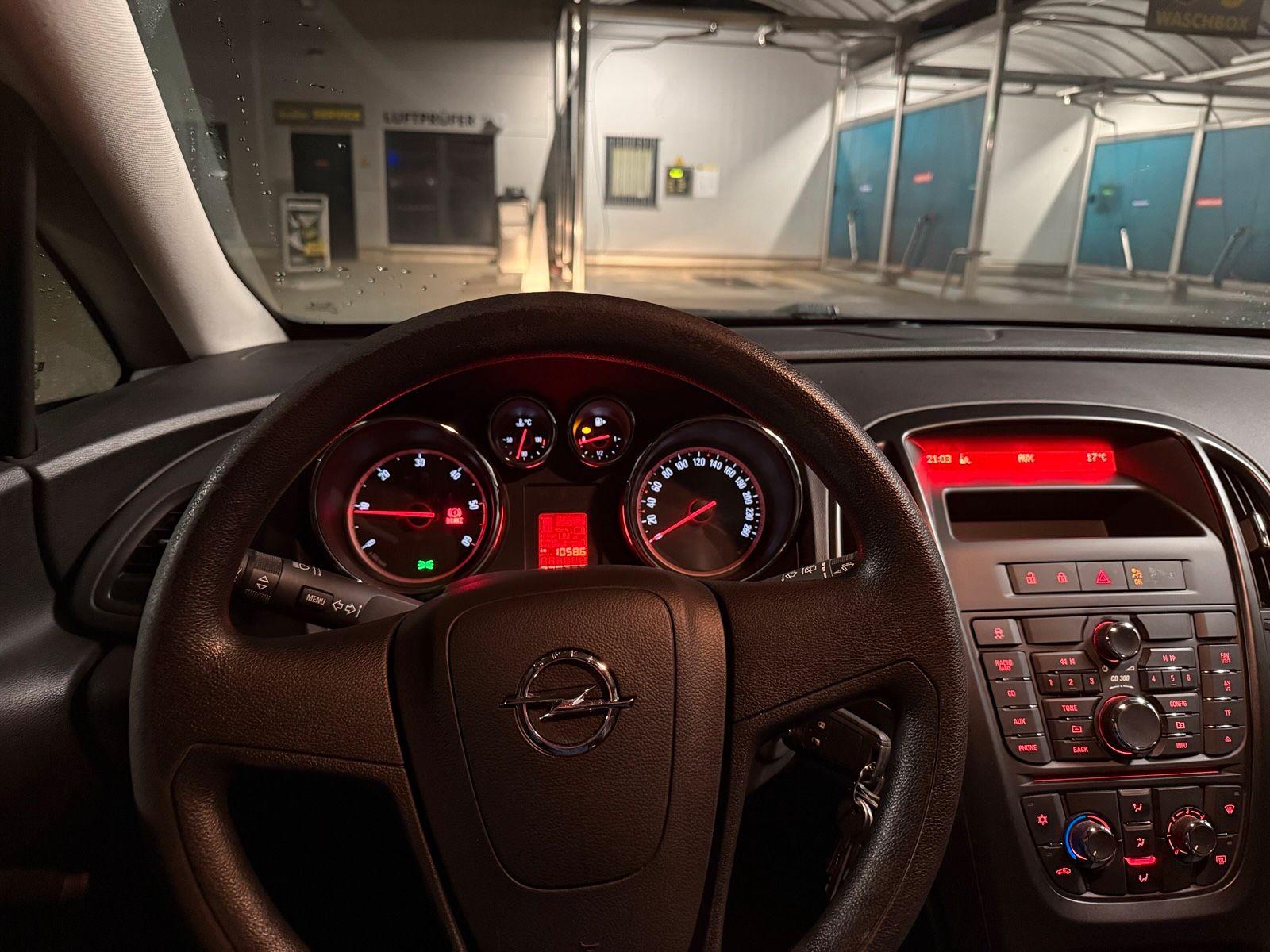 Opel Astra 2011 — engine 125 HP (92kW)