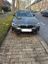 BMW 118i  Grau - BMW 1er Reihe mit Benzin-Antrieb: Kombi, Automatik