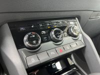 Skoda Karoq 1.5 TSI DSG Sportline PANO KAM AHK 4JGAR bei Autohaus Landmann & Maier OHG