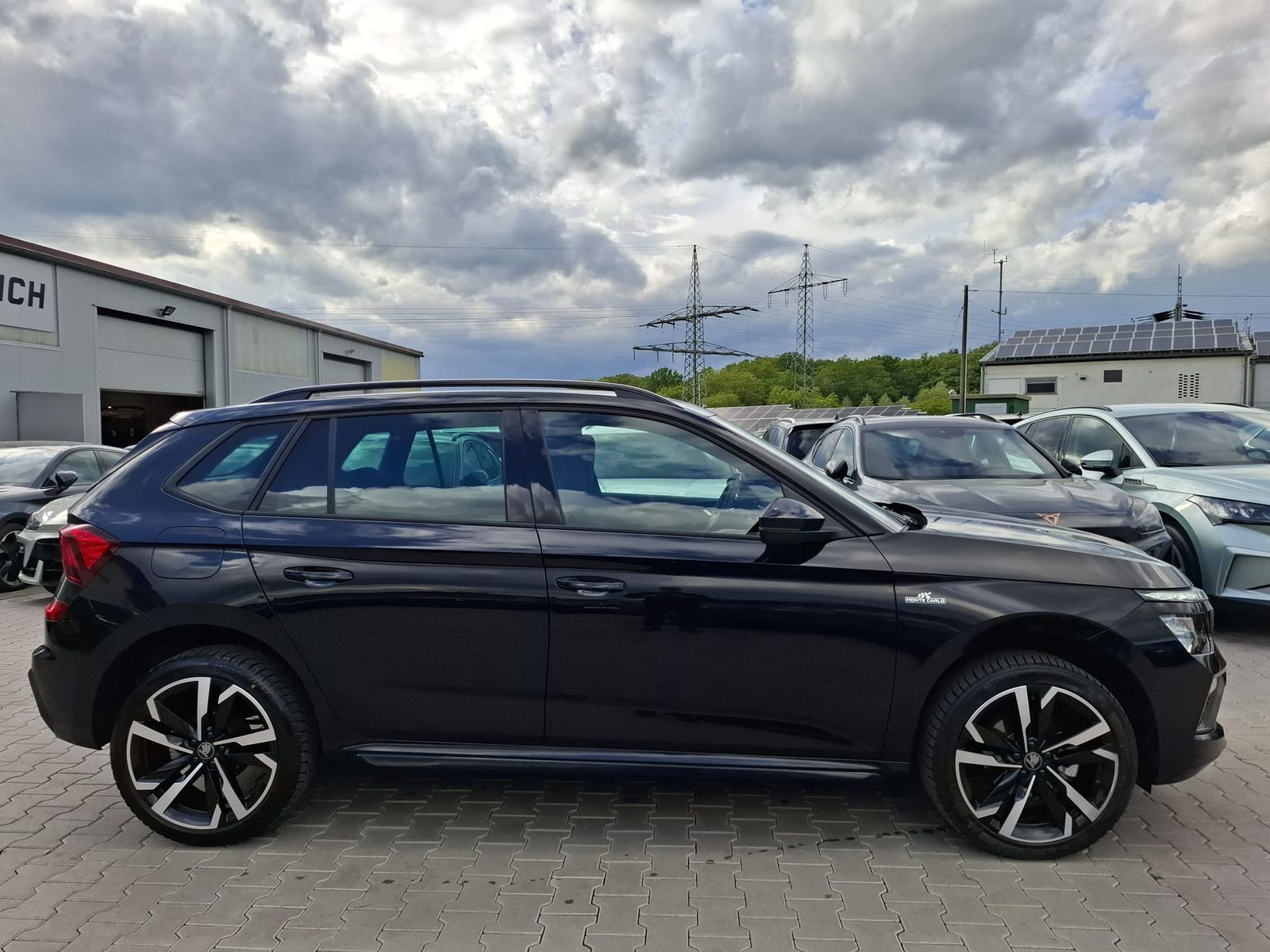 Fahrzeugabbildung SKODA Kamiq 1.5 TSI DSG Monte Carlo PANO*MATRIX*5J.GAR