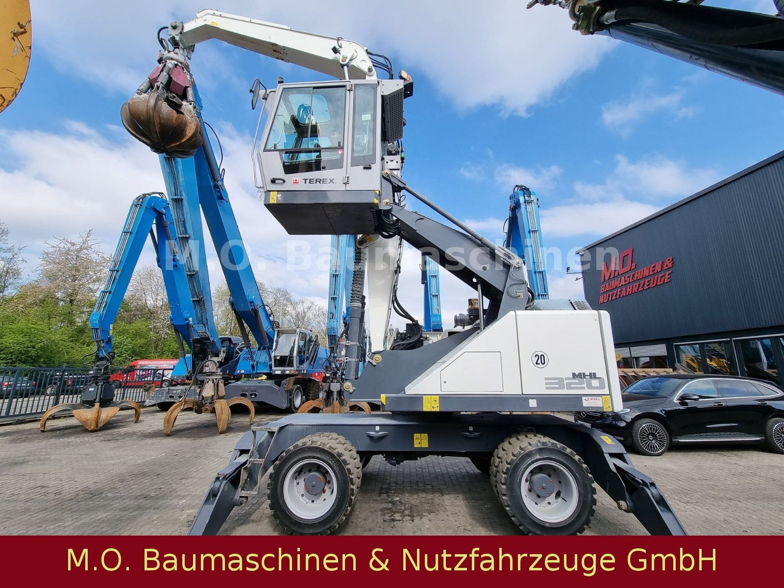 Fahrzeugabbildung Terex Fuchs MHL 320 / AC /  Polypgreifer