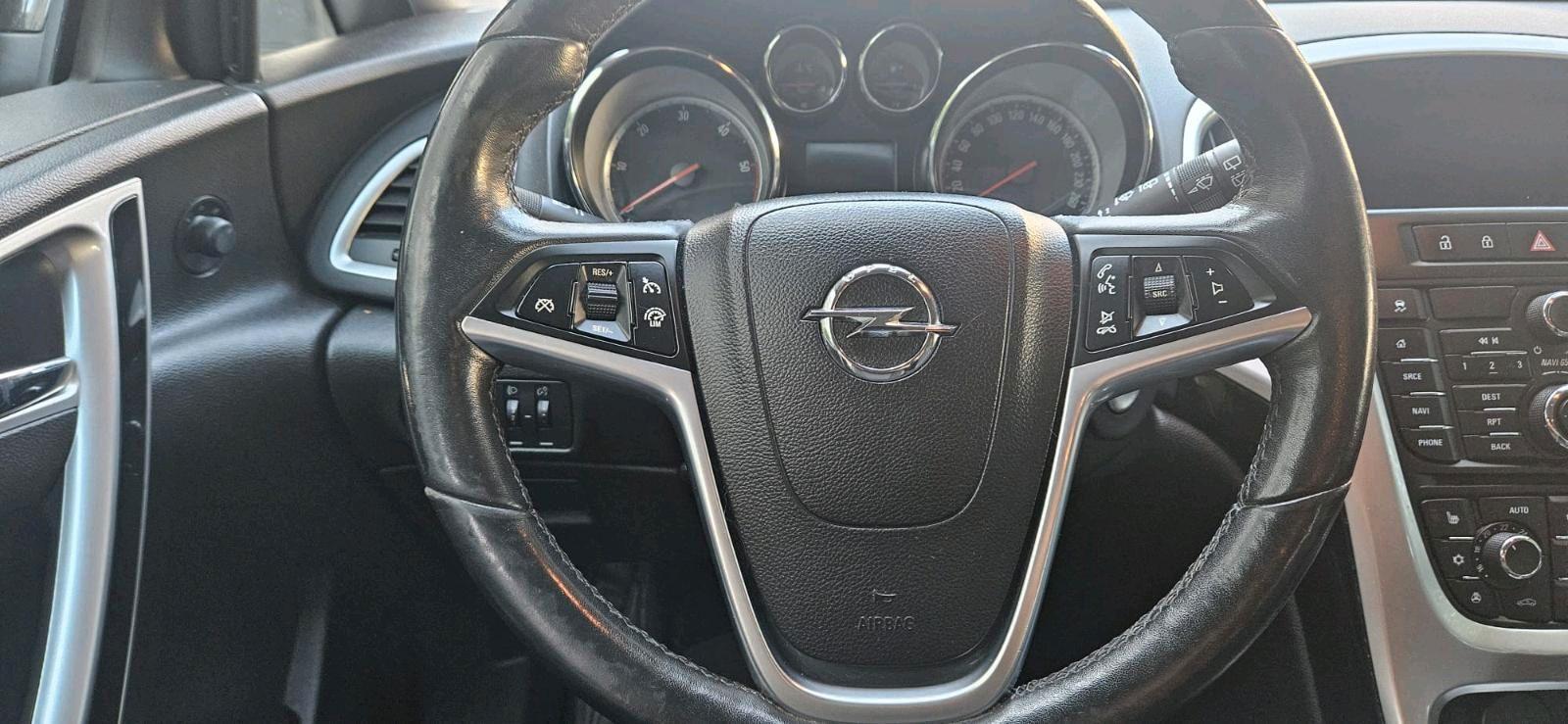 Opel Astra 2014 — photo 12