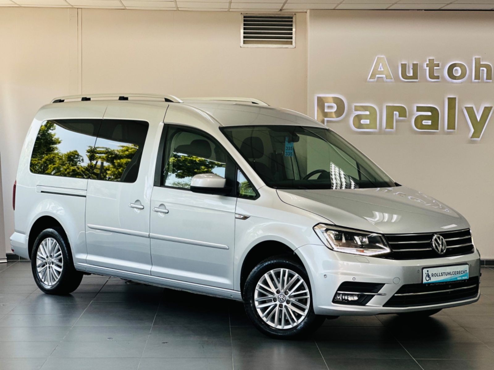 Caddy Maxi Rollstuhlgerecht-Rampe + E-Sitz