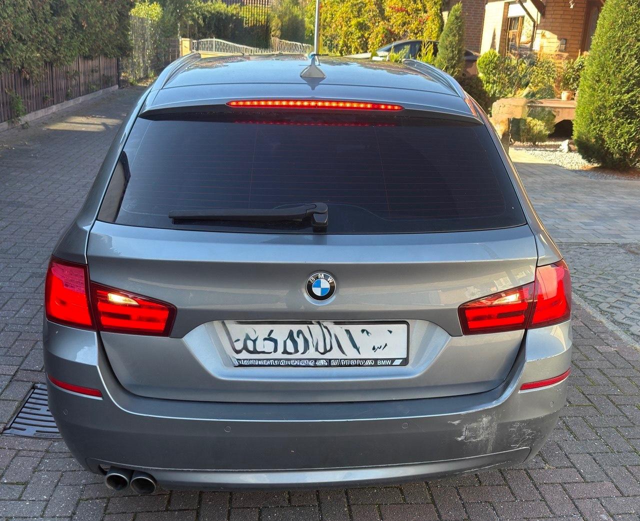 BMW 530 2011 — rear view