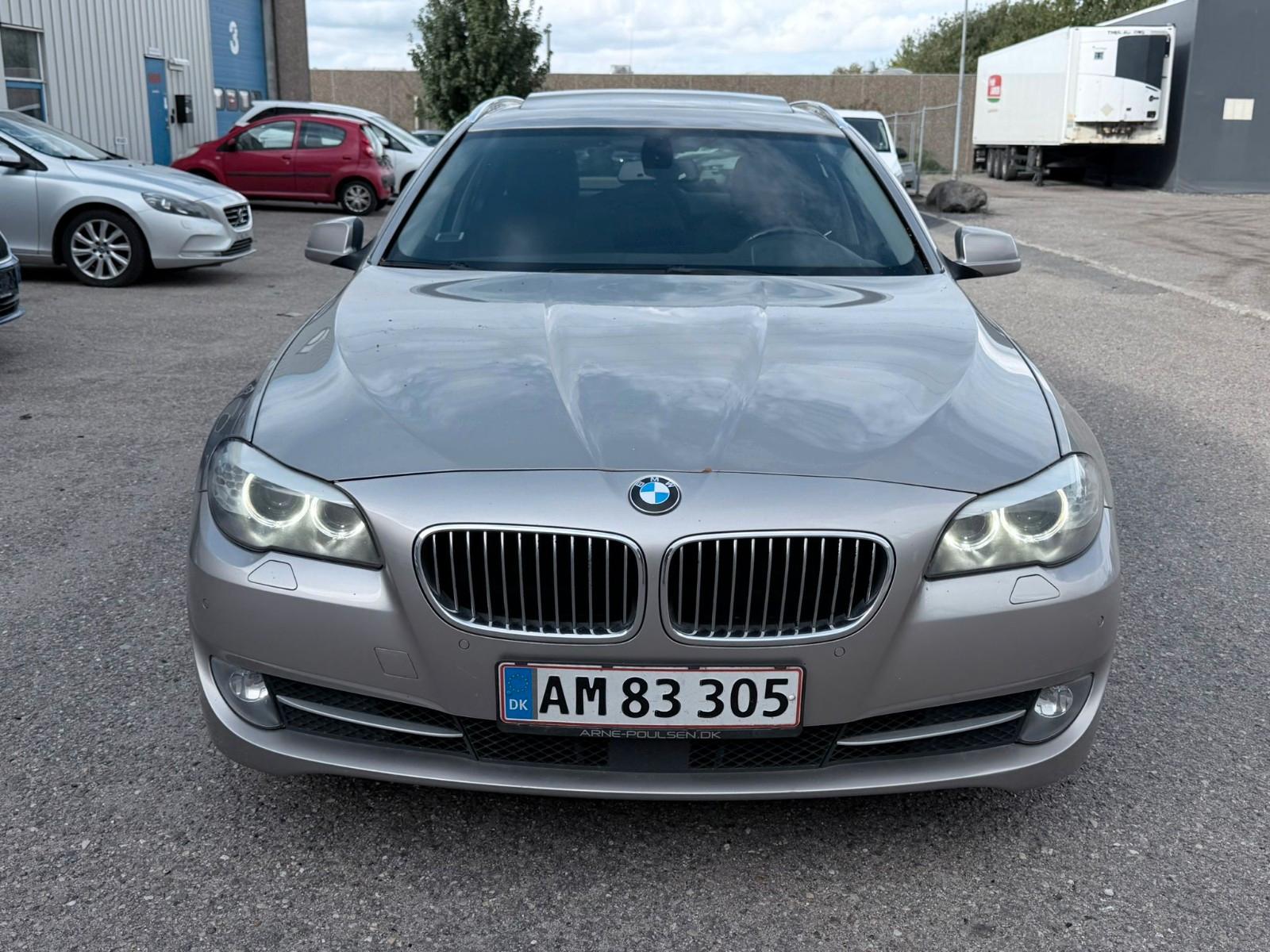BMW 530 2010 — rear view