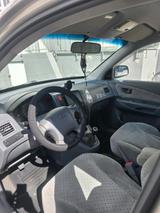 Hyundai Tucson - Hyundai Accent aus 2004