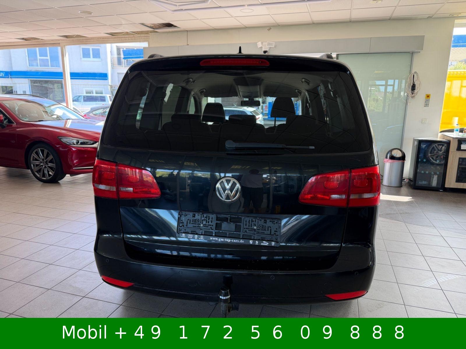 Volkswagen Touran 2011 — photo 35