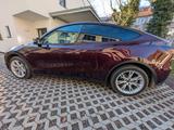 Tesla Model Y Long Range 2024 Modell AWD Rot - rote Tesla Model Y