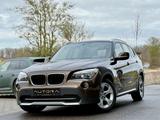 BMW X1 18 i sDrive AUTOMATIK|1.HAND|NUR 34TKM|KLIMA| - BMW X1 aus 2012 mit Benzin-Antrieb: Geländewagen