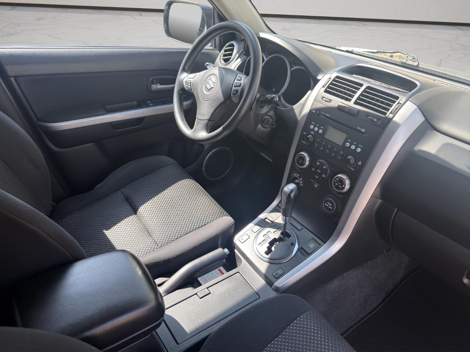 Suzuki Grand Vitara 2.0 140 ch Comfort+ • BVA • 4x4 • Toit ouvrant • Sièges chauffants