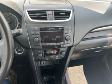 Suzuki Swift Comfort 1.2 1. Hand!
