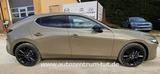 Mazda 3 2.0 e-SKYACTIV G 150 6AT Sondermodell Nagisa - mit Benzin-Antrieb: Beige, mit Klimaautomatik