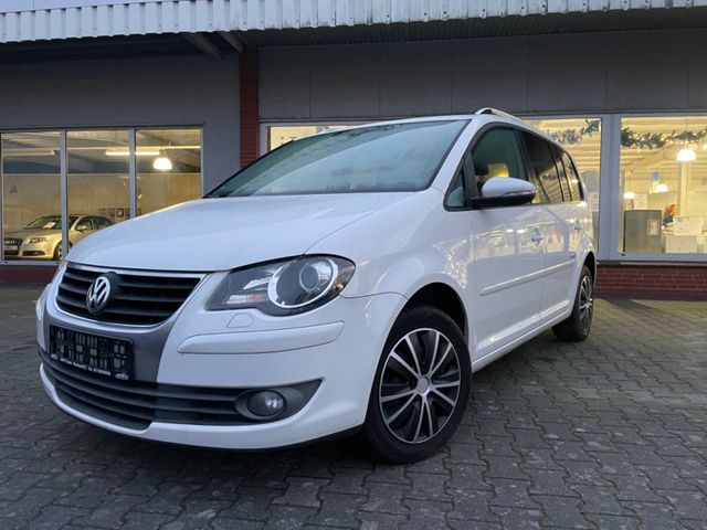 Volkswagen Touran Freestyle EcoFuel 7Sitzer Navi PDC Gas