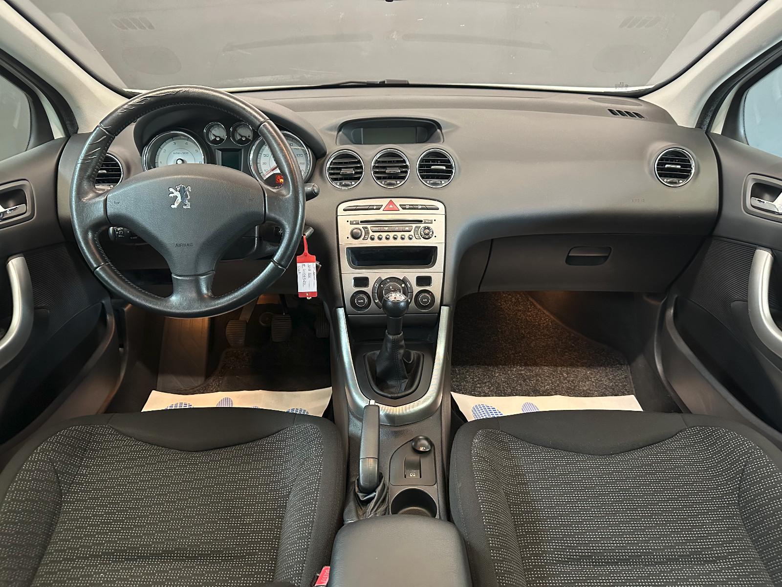 Peugeot 308 2009 — photo 11