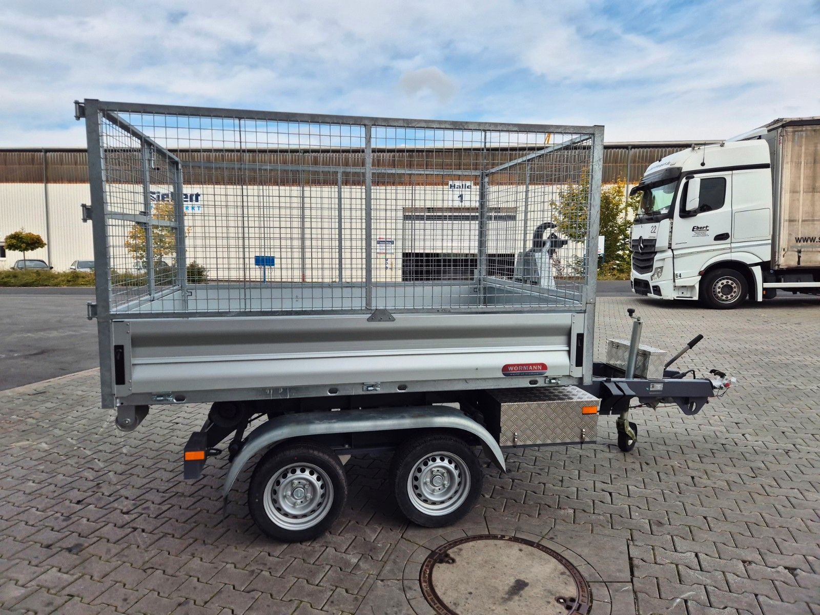 Fahrzeugabbildung Wörmann Abrollkipper Mulde Gitterbox