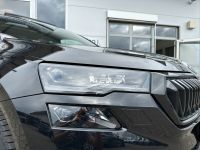 SKODA Karoq 2.0 TSI DSG 4x4 Sportline PANO AHK 5J GAR bei Autohaus Landmann & Maier OHG