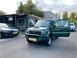 Suzuki Jimny 1.3 4WD 1.Hand Scheckheftgep TÜV AHK Euro5 - Suzuki Gebrauchtwagen in Bonn