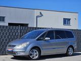 Ford Galaxy 2.0 TDCi Ghia 7-S PANO BI-XEN SHZ PDC AHK - gebrauchte Ford Galaxy aus dem Jahr 2009