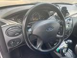 Ford Focus 2.0 Ghia Autom. Ghia - Ford Focus aus 2003: Ghia